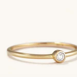 14k gold ring with one diamond