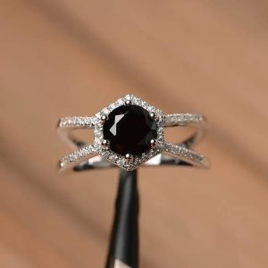 Black onyx ring on silver with cubic zirconia
