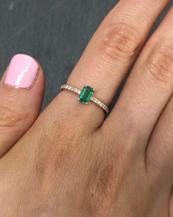 0.6 carat Emerald Cut Emerald and cubic zirconia