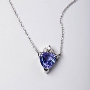 Trillion cut tanzanite necklace with American zirconia on silver
