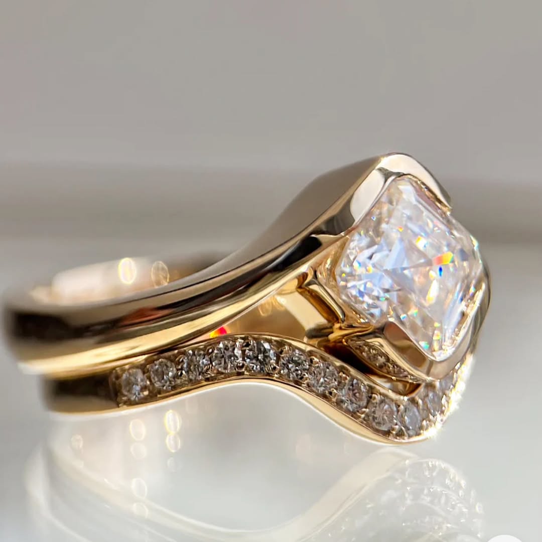 2.5ct ascher cut moissanite set on 18k gold band with a wedding band