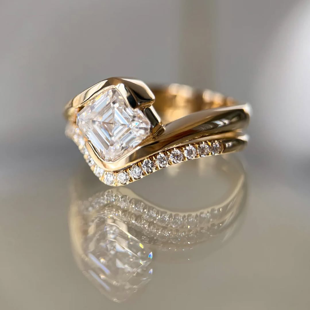 2.5ct ascher cut moissanite set on 18k gold band with a wedding band