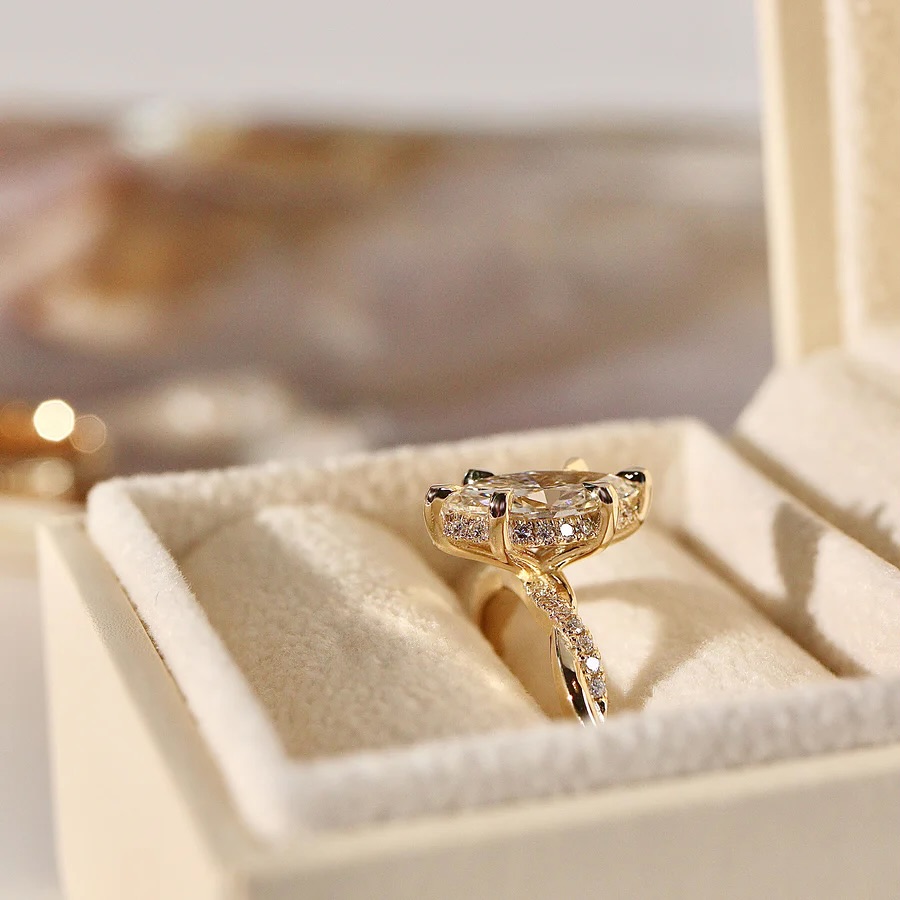 1.5 carat Marquis on 18K gold with accent diamonds Rope design