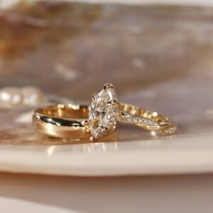 1.5 carat Marquis on 18K gold with accent diamonds Rope design